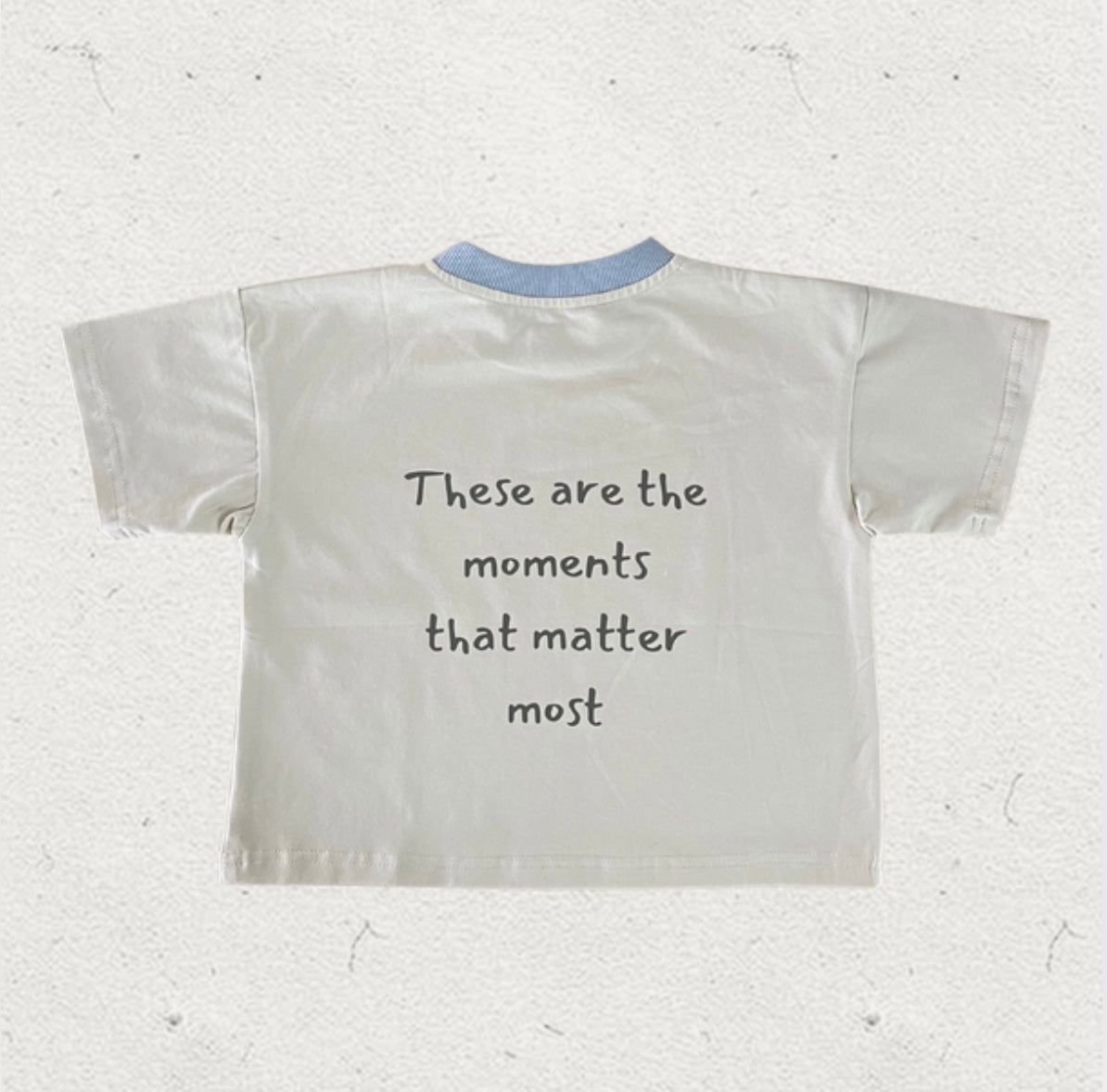 moments tee