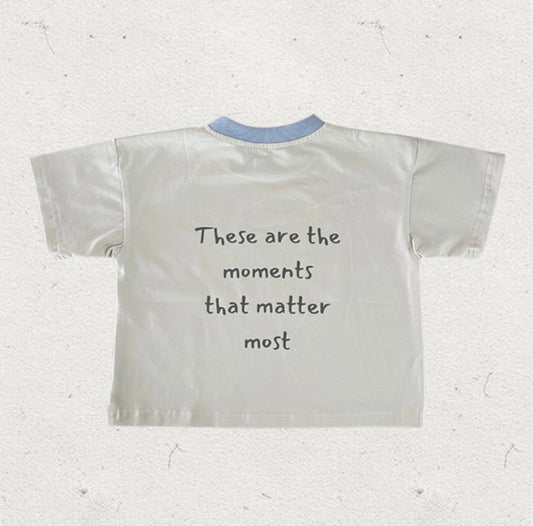moments tee